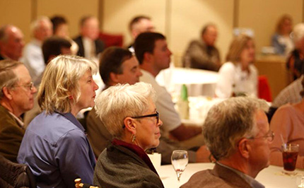 Attendees listen to Anne Mitchell Whisnant ’91 (MA, ’97 PhD)