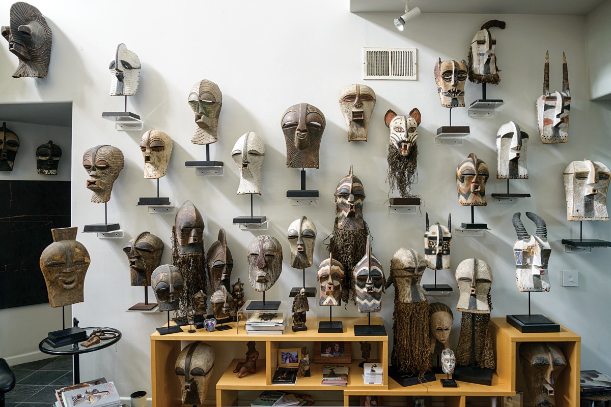 Woods Davy mask collection on wall