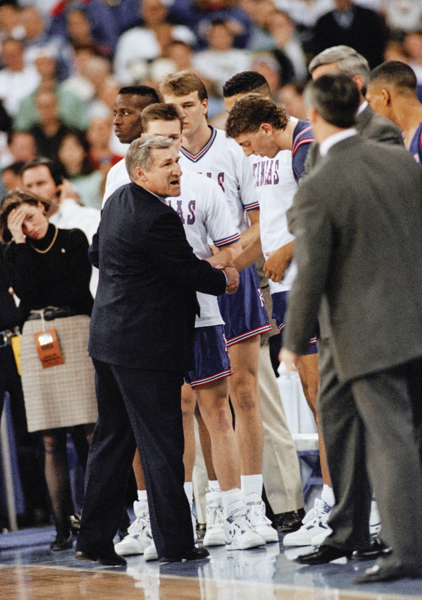 Dean Smith with Kansas players at Final Four 1991